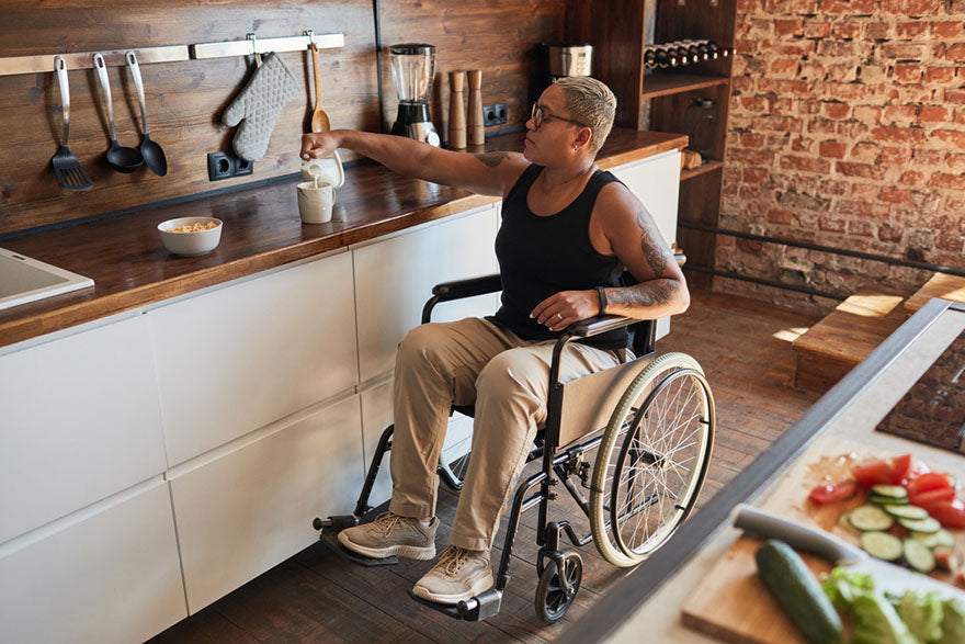 handicapped person using utensils