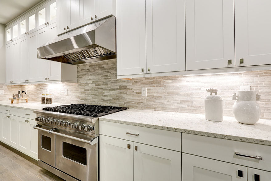kitchen features white shaker cabinets